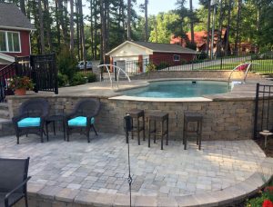 Swimming Pool on Terraced Hill with Pool Bar Feature