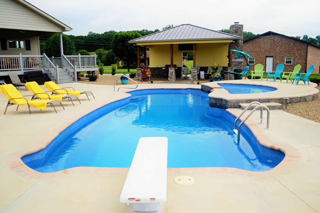 Cheery Pool Cabana Sits Alongside Multi Level Swimming Pool