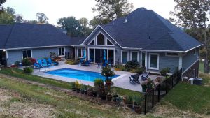 Inground pool in a courtyard like setting with integrated tanning ledge built near Dandridge, TN