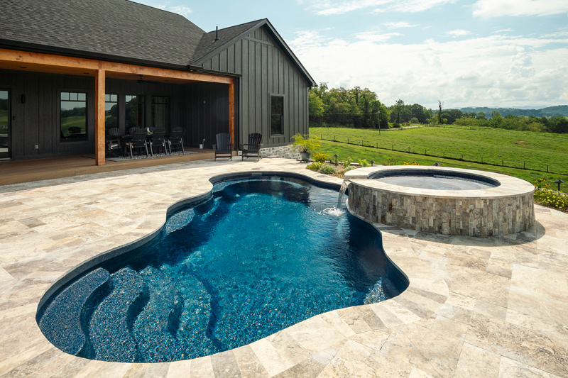Molded stairs in the pool provide an elegant entry solution